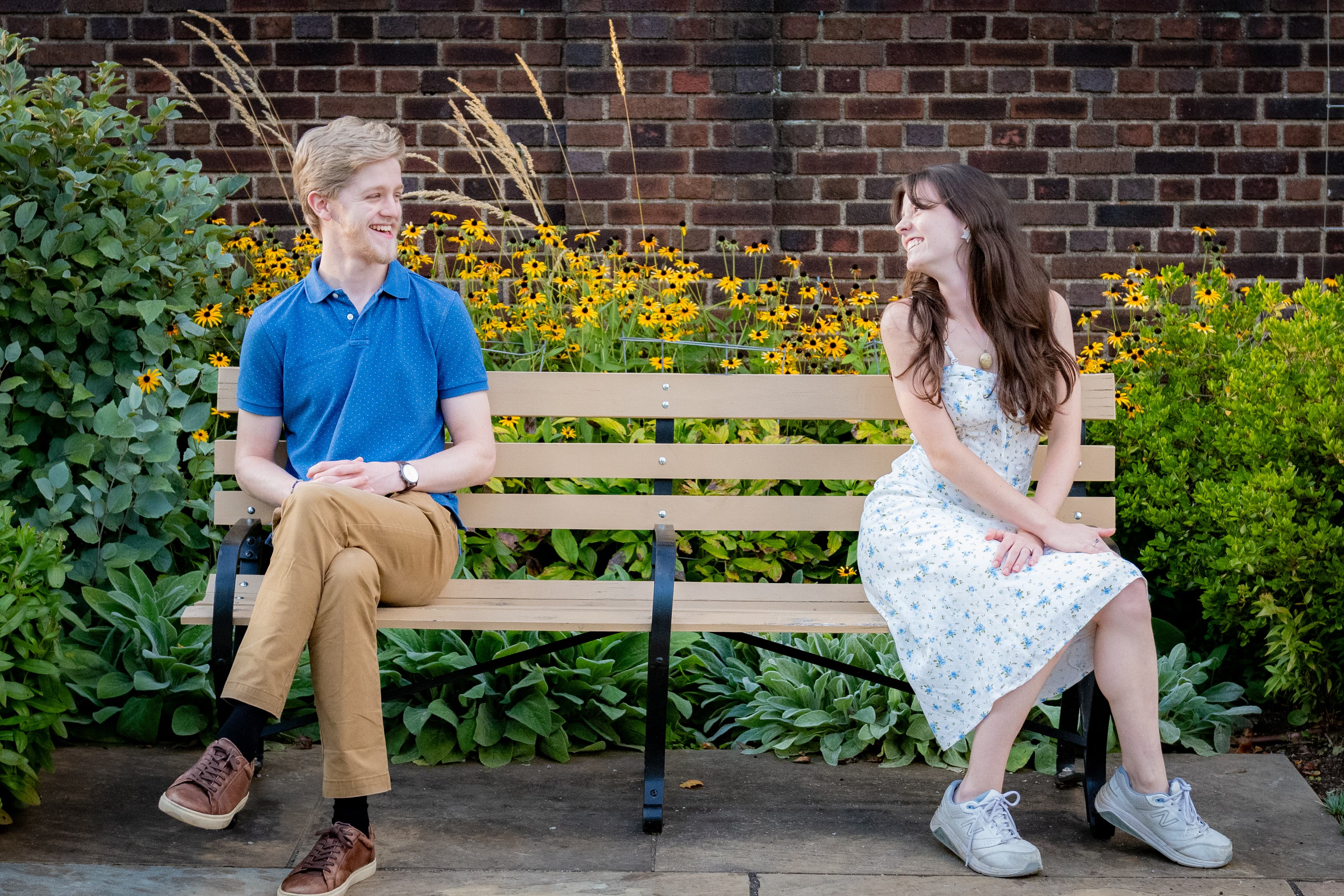 Couple smiling on bench